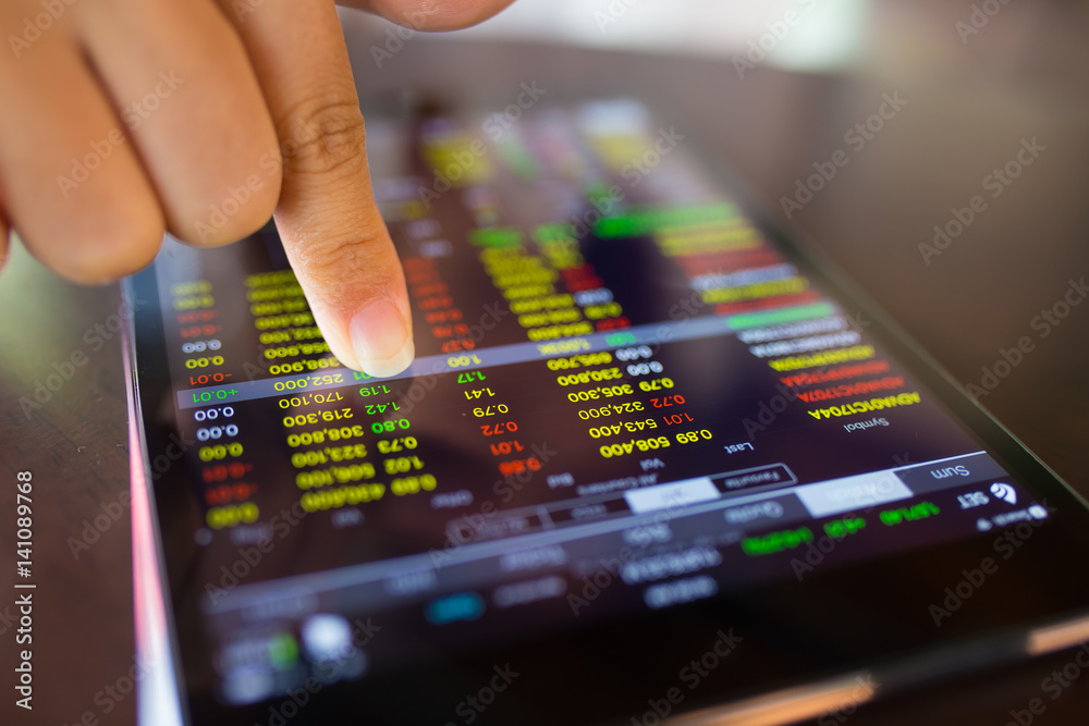 Businesswoman check data in tablet Businesswoman check data in tablet