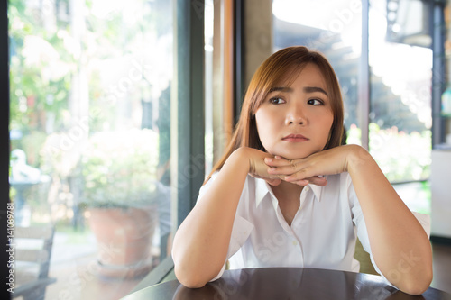 Woman so sad at coffee shop Free Download Woman so sad at coffee shop - GFXLoad