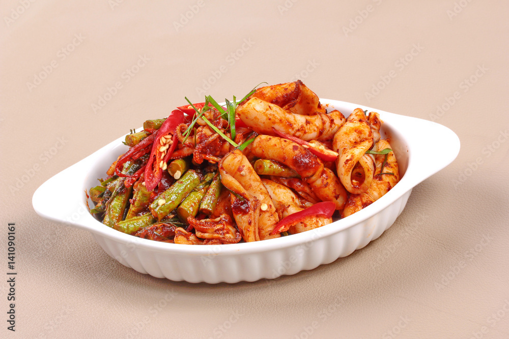 Spicy fried cowpea and squid with roasted chile paste.
