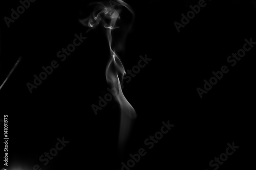 Abstract background with curve shape white smoke on black background