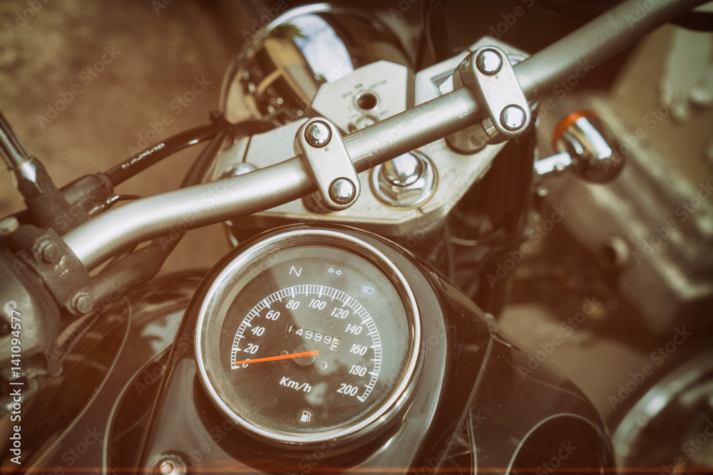Gauges of old classic motorcycle, vintage sepia color effect