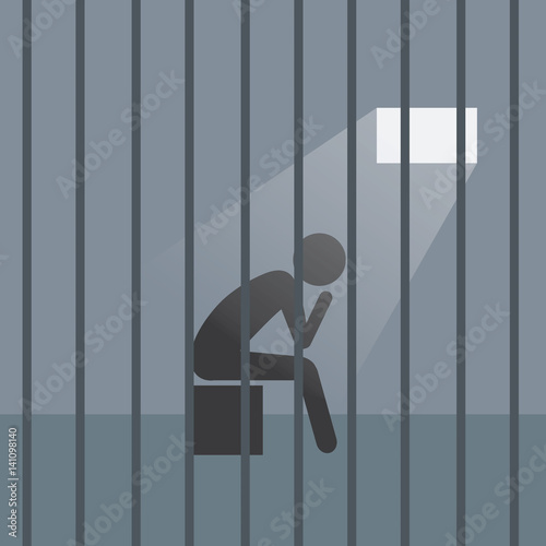 man in dark prison