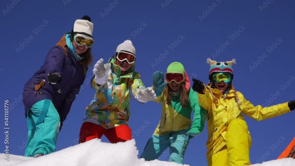Group of snowboarders having Group of snowboarders having
