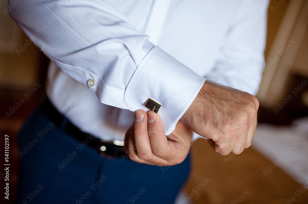 The man button white shirt. The man button white shirt.