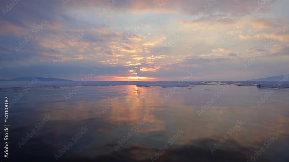 Prores codec. Winter. Sunset and sunrise on Lake Baikal, covered with ice and snow Prores codec. Winter. Sunset and sunrise on Lake Baikal, covered with ice and snow