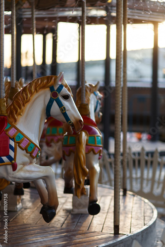 Children's carousel with horses outdoor