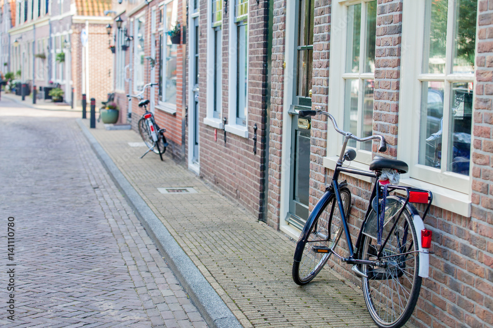 AMSTERDAM, NETHERLANDS - September 22, 2014: beautiful view on street with bicycles