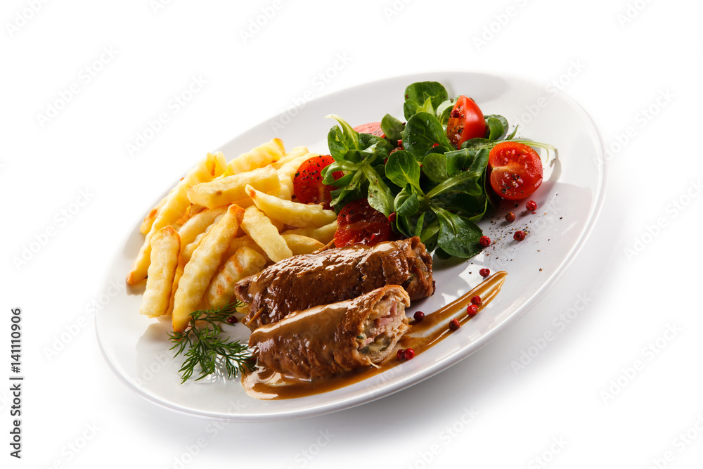 Wrapped pork chops with french fries Wrapped pork chops with french fries