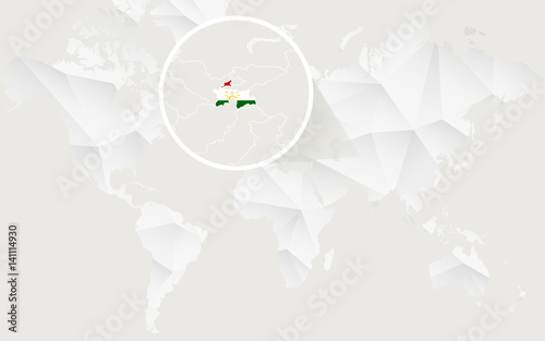 Tajikistan map with flag in contour on white polygonal World Map.