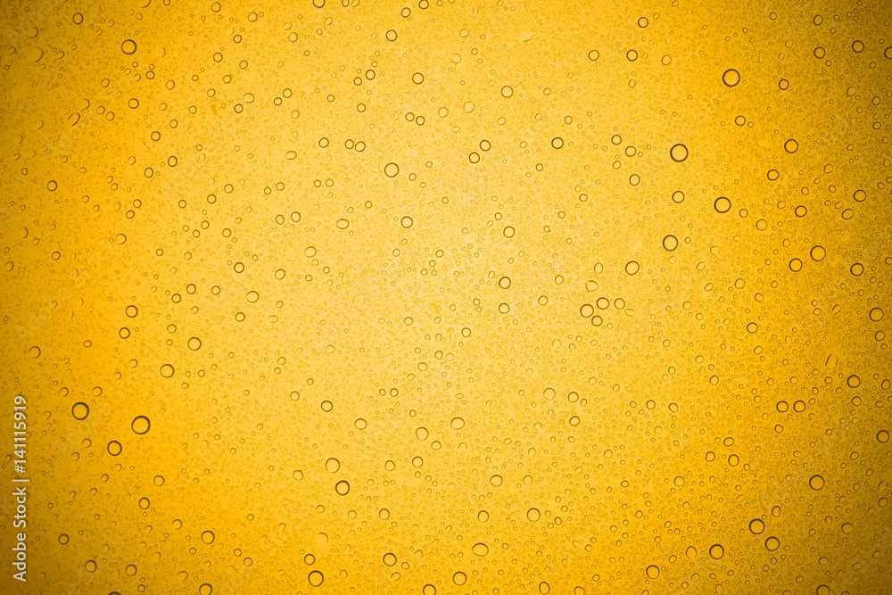 Water drops on yellow glass, Rain droplets on glass background. Water drops on yellow glass, Rain droplets on glass background.