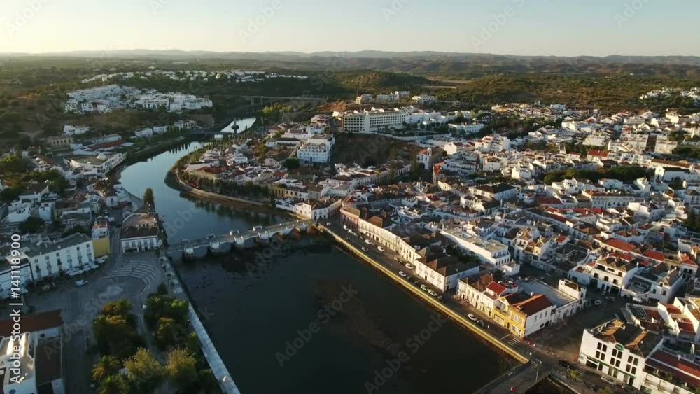 Aerial. Roman old bridge in Tavira, view from the sky.