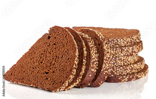 slices of black bread with sesame seeds isolated on white background