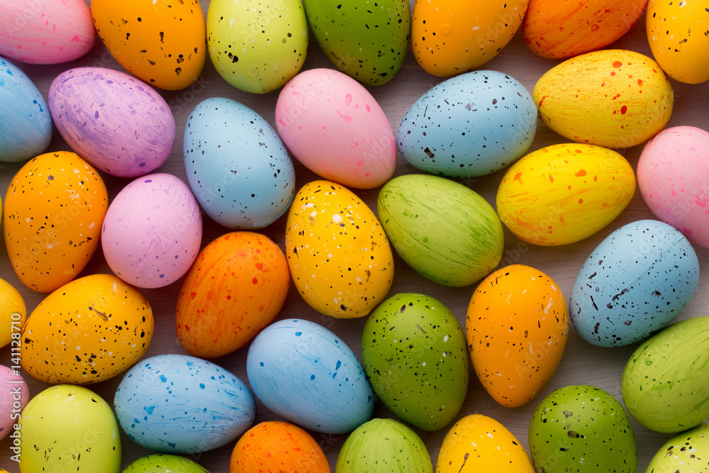 Small multicolored Easter eggs. Spring background. Small multicolored Easter eggs. Spring background.