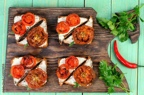 Vegetarian sandwiches and red pepper with parsley.