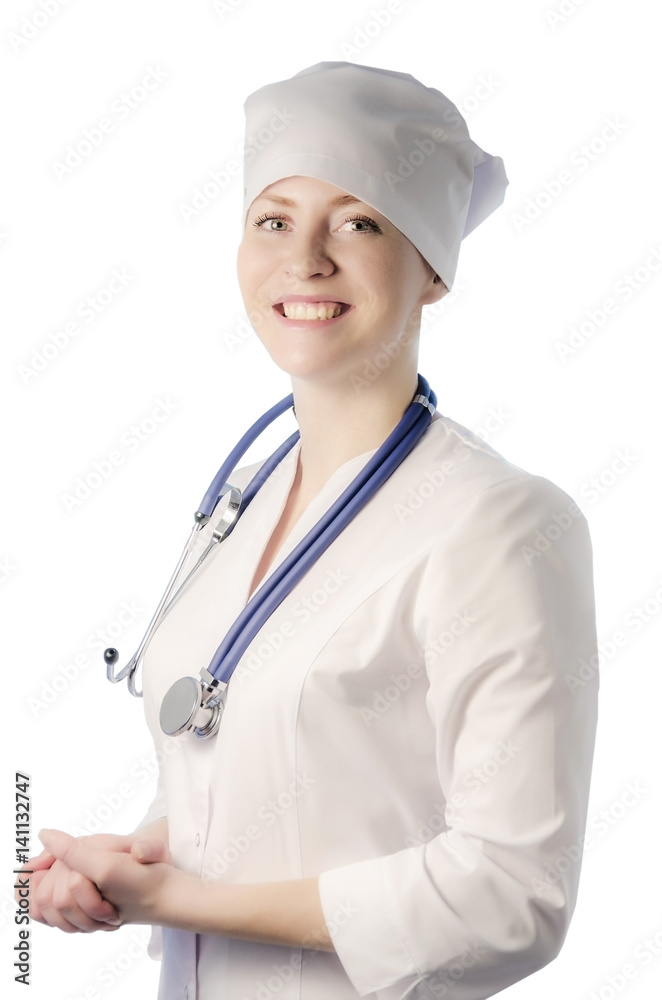 Young woman medical doctor portrait in white coat and cap with stethoscope isolated on white background. Young woman medical doctor portrait in white coat and cap with stethoscope isolated on white background.