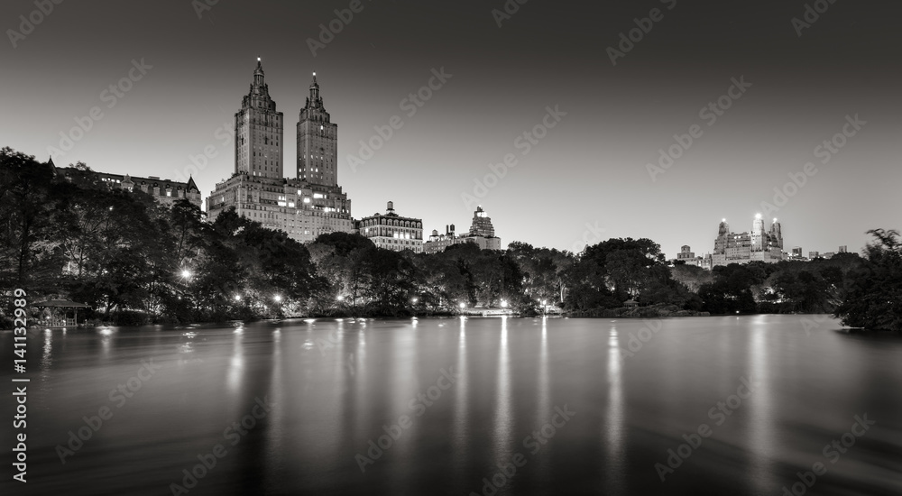 Central Park and city lights across The Lake at twilight. Black & White. Upper West Side, Manhattan, New York City