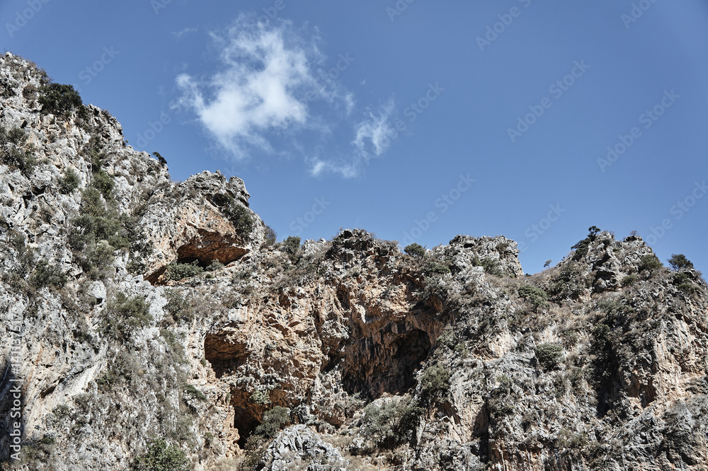 Rocky slope Deliana gorge on the island of Crete. Rocky slope Deliana gorge on the island of Crete.
