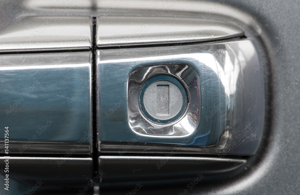 Obraz premium Lock on the door handle of the car