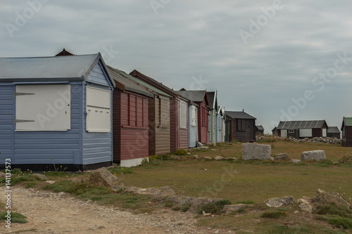 Multi cloured beach huts at Jurassic Coast, Dordet, England
