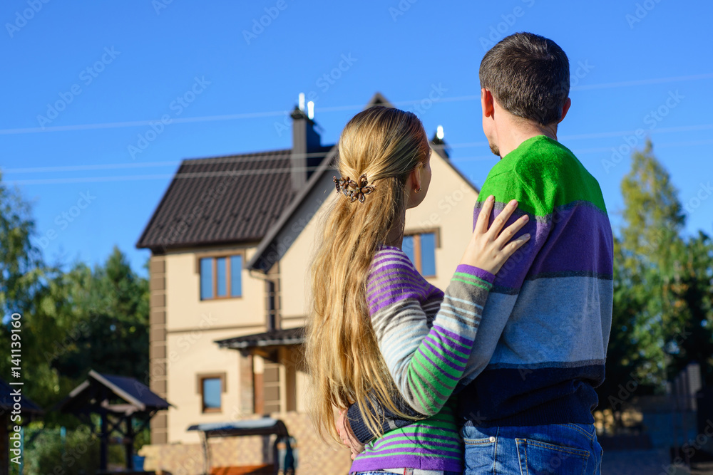 Couple looking on house Couple looking on house