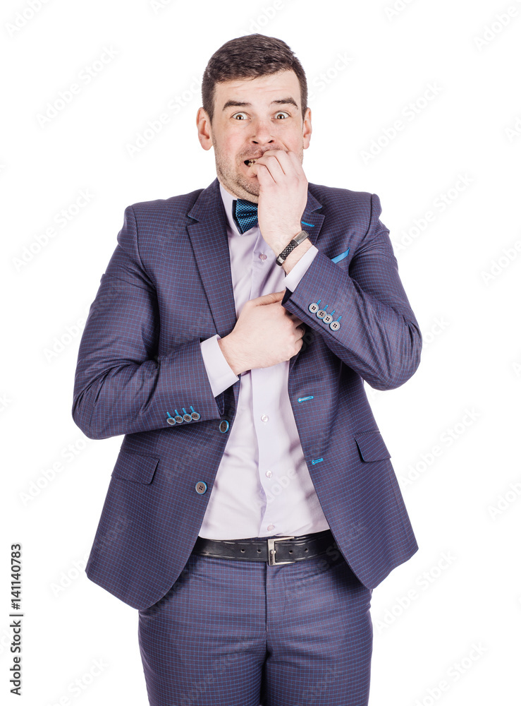 business man biting his nails fingers freaking out. human emotion expression and lifestyle concept. image on a white studio background.. business man biting his nails fingers freaking out. human emotion expression and lifestyle concept. image on a white studio background..