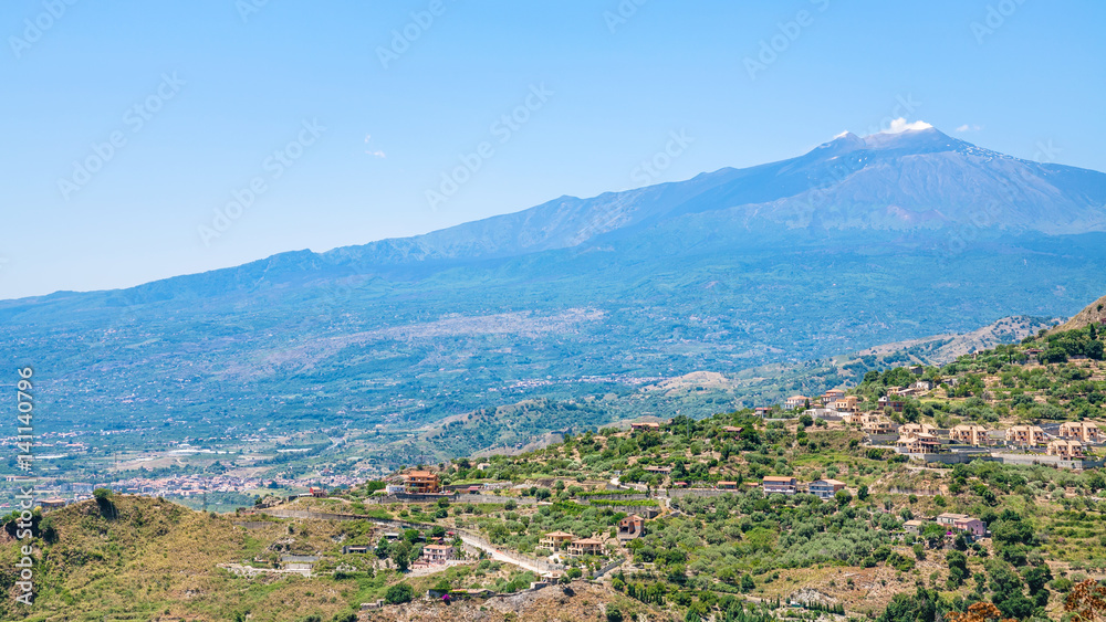 panorama with villages and Etna volcano in Sicily