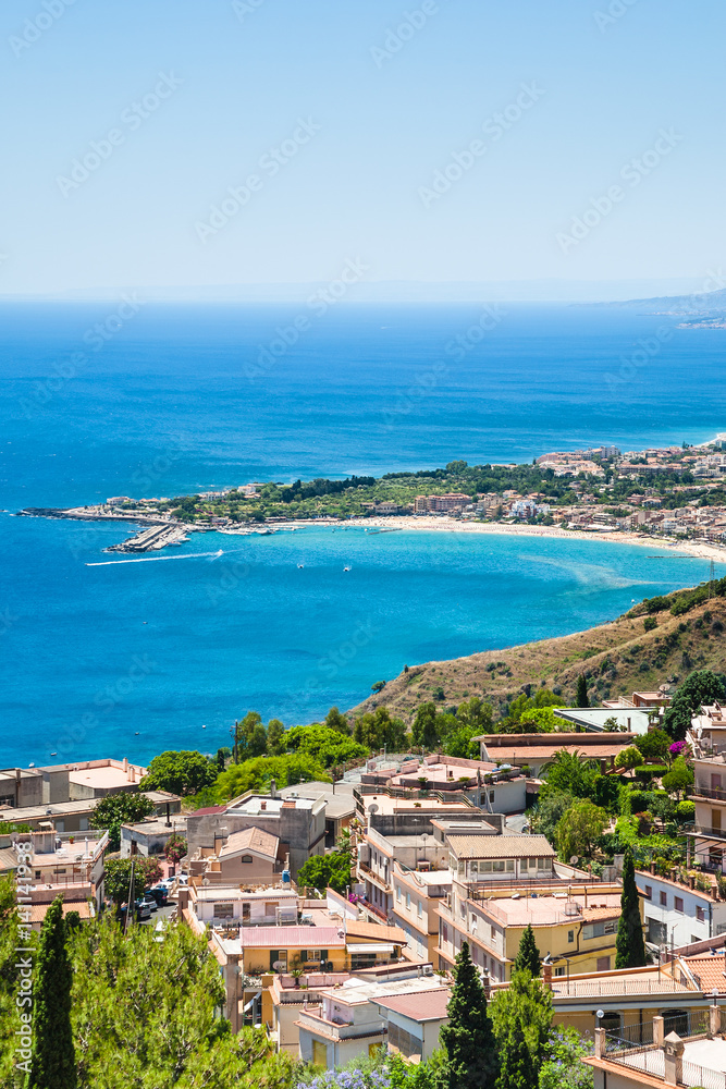 view of Taormina city and giardini naxos beach