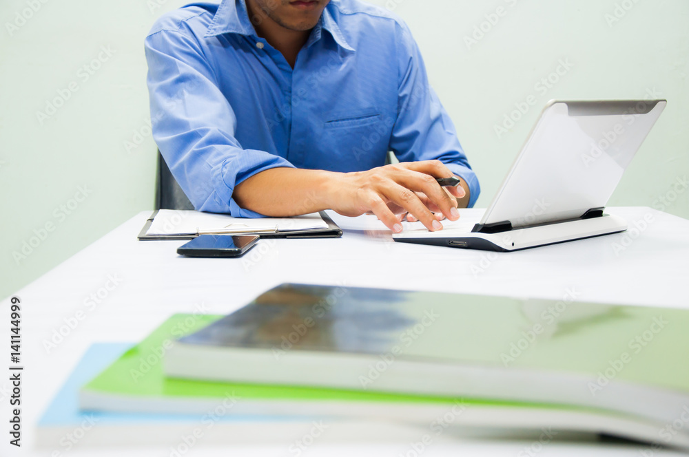 Businessman working at office. Digital tablet laptop computer smart phone using, keyboard. Connection internet application online. Finance manager. Banking.