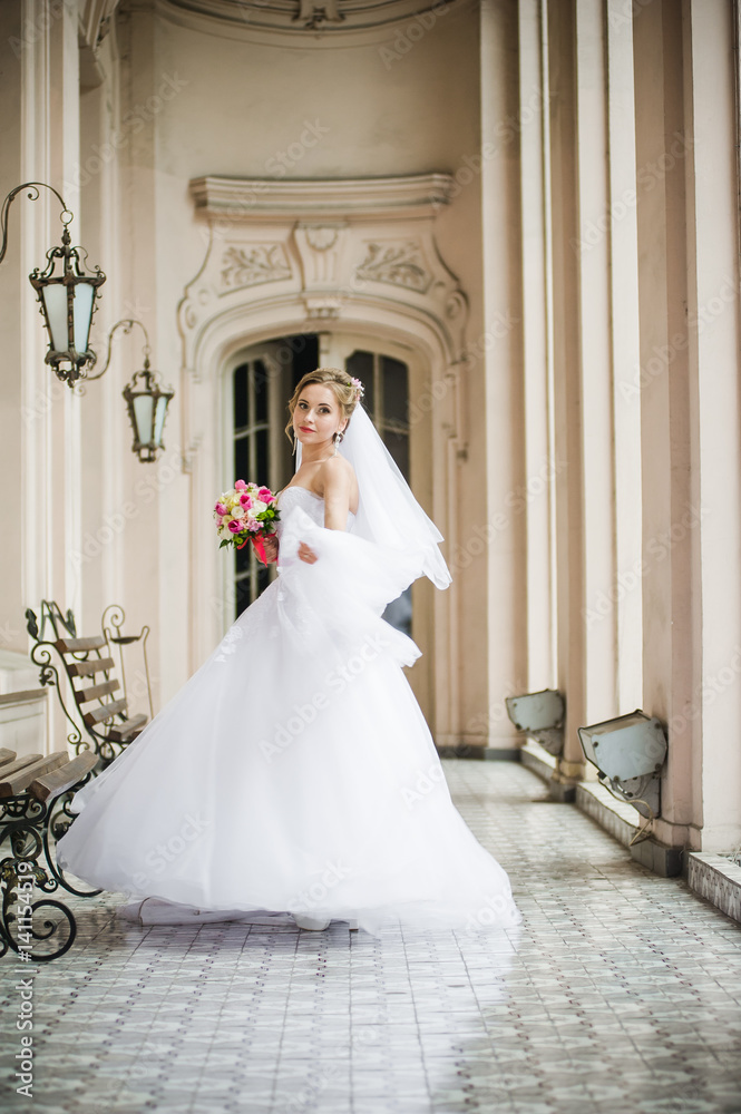 Beautiful bride walking in the old castle Beautiful bride walking in the old castle