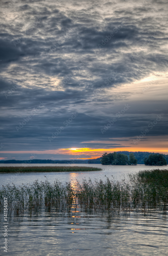 Obraz premium Sunset at a lake