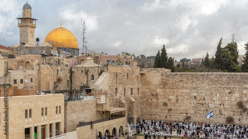 The Western Wall and golden Dome of the Rock on the Temple Mount, Jerusalem, Israel.