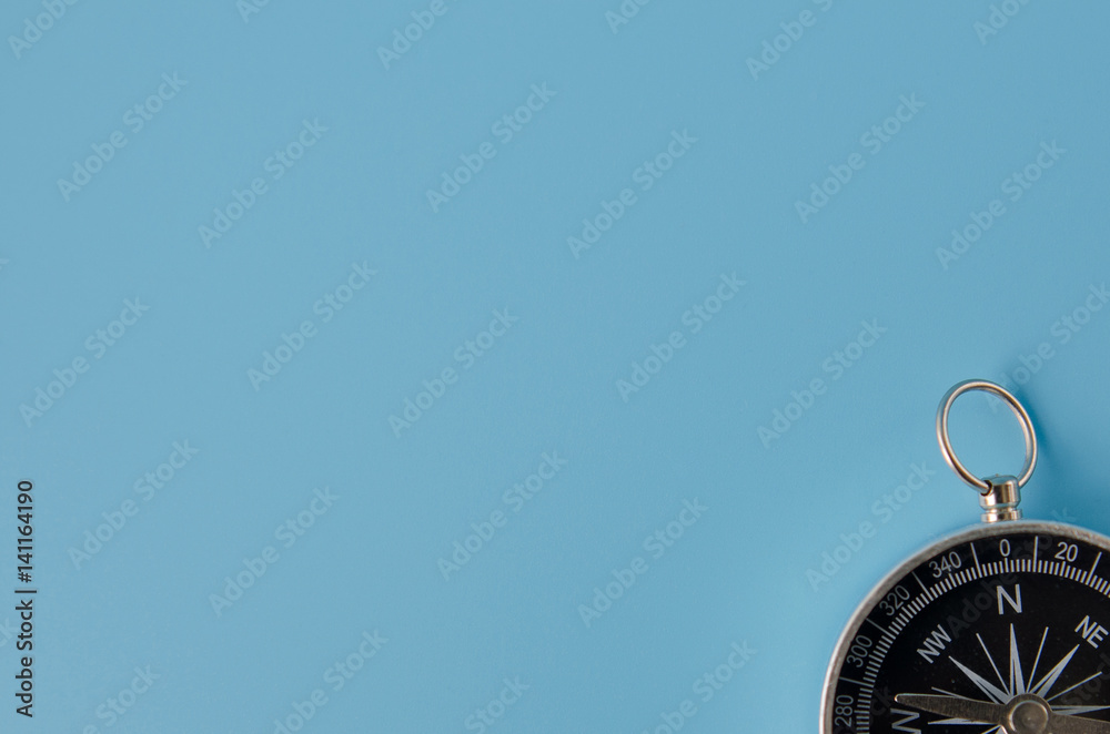 part of compass on a blue background