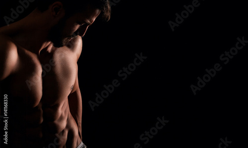 Attractive muscular man posing