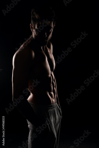Young muscular man posing © Cherries