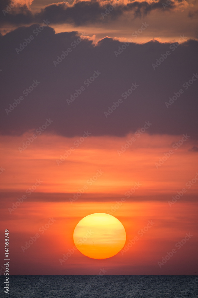 Big sun at sunset in Phuket - Thailand Big sun at sunset in Phuket - Thailand