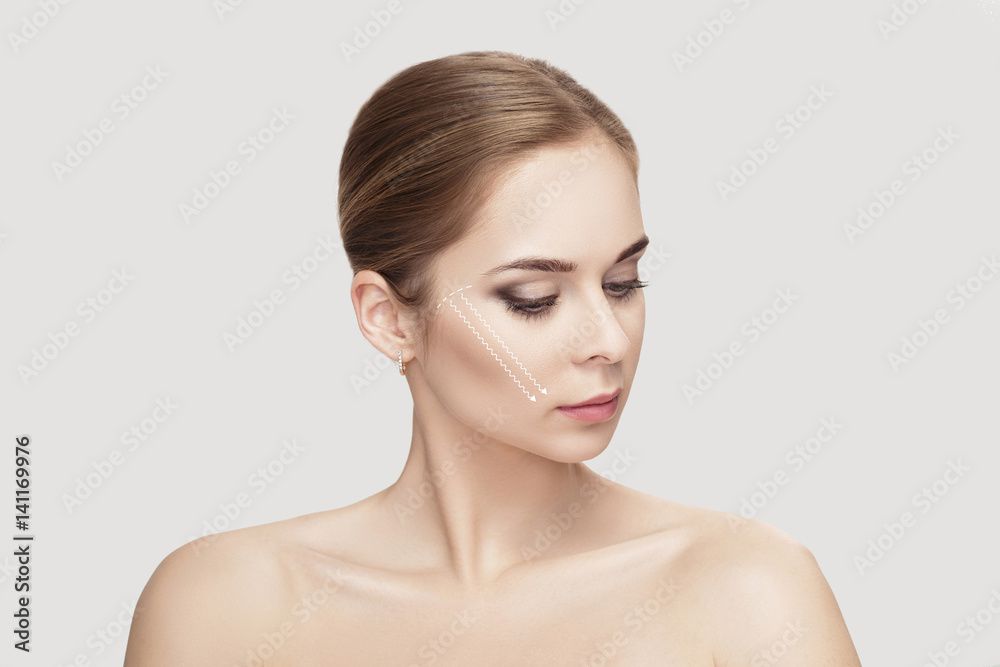 profile portrait of beautiful blonde woman with green eyes on grey background closeup. girl with clean skin profile portrait of beautiful blonde woman with green eyes on grey background closeup. girl with clean skin