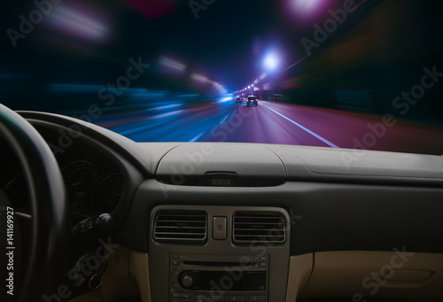 car moving on highway at night