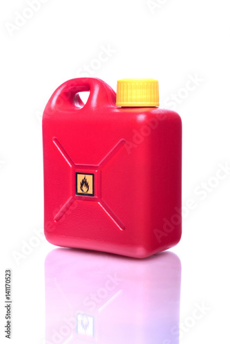 Red canister for dangerous liquids on a white background