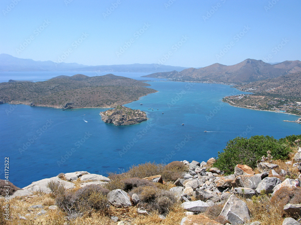 Crete. Panorama of Mirabello bay with Spinalonga fortress and Elounda.
