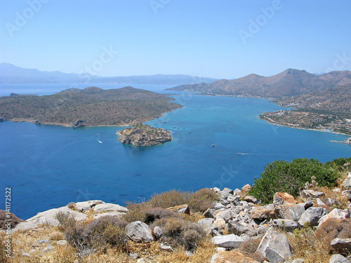 Crete. Panorama of Mirabello bay with Spinalonga fortress and Elounda.   © Yozhik