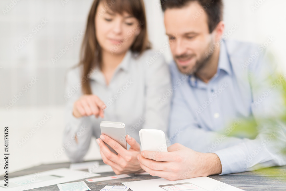 Designers drawing website ux app development.