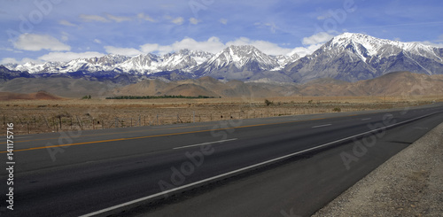 Alpine scene with snow capped mountains in the Eastern Sierra near Yosemite National park, Sierra Nevada Mountains, California a popular place for RV trips, family vacations, backpacking and hiking