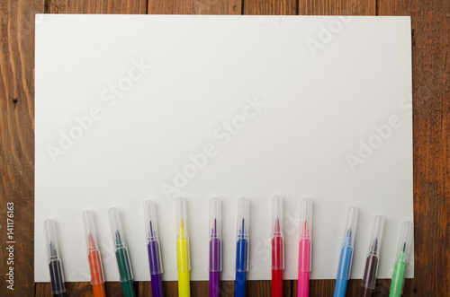 Colored felt-tip pens with white sheet