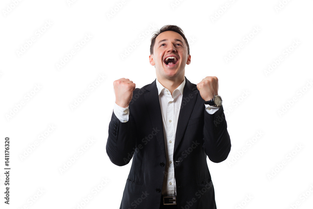 young man in a suit on a white background showing signs young man in a suit on a white background showing signs