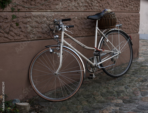 Public transport, bicycle parked at the wall © buenafoto