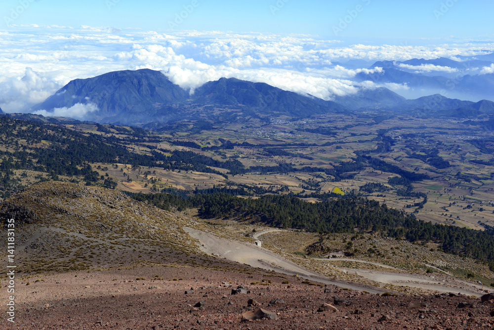 Fototapeta premium Open landscape with Mountain terrain near Pico de Orizaba volcano, or Citlaltepetl, is the highest mountain in Mexico