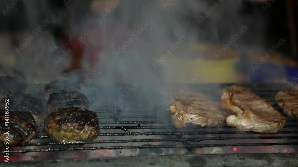 Steaks and burgers on the grill Steaks and burgers on the grill