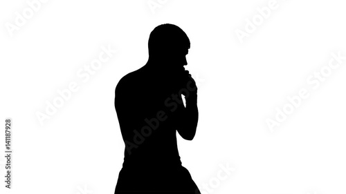 Silhouette of a boxer in training