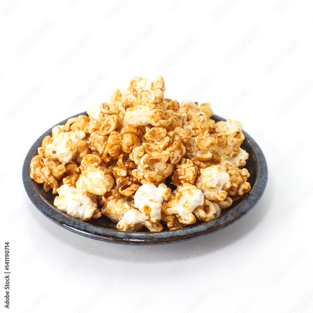 Unhealthy popcorn snacks on a white background Unhealthy popcorn snacks on a white background