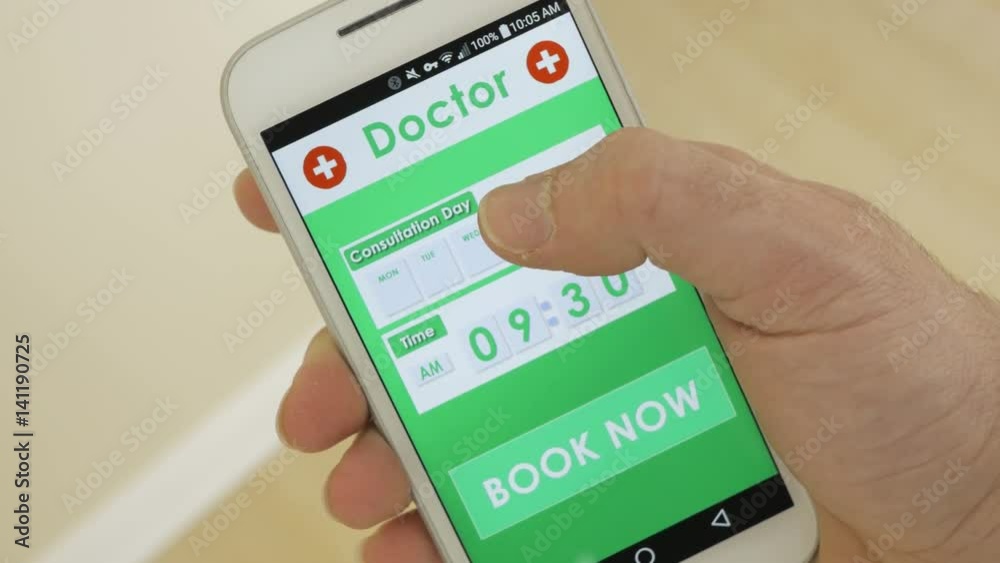 Using a smartphone to book a doctor appointment using an application. Using a smartphone to book a doctor appointment using an application.